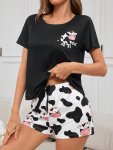 Women's Cute Cow Print Pajama Set Short Sleeve Round Neck Top & Shorts Comfortable Relaxed Fit