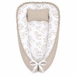 A Beige Laurel Leaf Baby Nest Pod Newborn Lounger