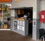 Coffee Kiosk In Busy Strip Mall