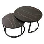 A Set Of Two Round Nested Coffee Tables