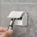 Organize Your Shower With A Razor Hanger And Electric Toothbrush Holder