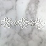 White Resin String Of Flower White
