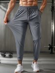 Men's Solid Regular Fit And Cuffed Sweatpants With Drawstring And Pockets Breathable And Stretchable Comfy Pants For Sports Wear