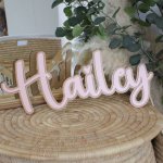A Wooden Name Cut Out Board Personalized Light Pink