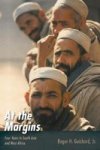 At The Margins Hardcover
