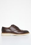 Elio - Brown
