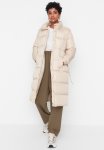 Arched Oversized Long Puffer Coat - Beige