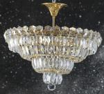 Crystal Chandelier With 24 Carat Gold Plated Detail.