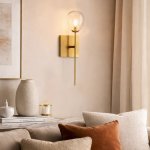 Teardrop Clear Glass Wall Light With Brass Stem