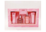 A Four-piece Women's Perfume Set Including Lotion And Cream.