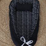 Baby Nest Baby Sleeping Pod Herringbone Stripes And Dashes Black Background