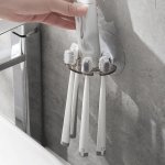 1PC Wall-mounted Toothbrush Holder Plastic Toothpaste Storage Rack No Drilling Required Bathroom Finishing Rack Toothbrush Holde