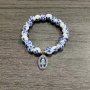 Porcelain Bracelet With Delicate Blue Flowers And Miraculous Medal With Blue Inlay