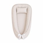 A Beige Light Baby Nest Pod Newborn Lounger