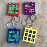 4PCS Tic-tac-toe Keychains - Perfect For Back To School Christmas & Halloween Parties - Fun Party Favors With Rotating Xo Design