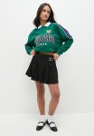 Pleated MINI Skirt With Buckle - Black