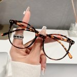 Chic Women's Tortoiseshell Round Frame Glasses - Fashionable Clear Lens Eyewear For Casual Attire