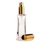 25ML Clear Glass Rectangle Base Curved Perfume Bottle With Gold Spray & Gold Cap 18/410