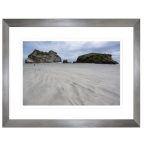 Rocky Outcrops Of Wharariki Beach Framed Print 1100 X 700