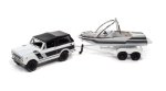 – 1:64 1979 International Scout II W Boat & Trailer Winter White – Hulls & Haulers