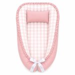 A Checkered Pink And Beige Baby Nest Pod Newborn Lounger