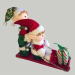Two Elfs On A Sleigh