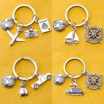 World Traveler Keychain - Alloy Charm With Airplane Ship Truck & Bike Designs Compass & Camera Pendants - Perfect Gift For Adven