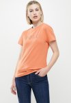 Polo Cassie Short Sleeve Nailhead Logo T-Shirt - Peach